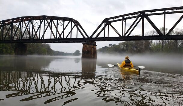 Human Powered Movement - Journal - Railroad bridge over the Wateree River just outside of Camden, SC. Paddling the entire length of the Wateree River with the Catawba Riverkeeper Foundation