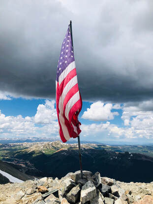 Human Powered Movement - Journal - Tenmile Range - Frisco to Breckenridge - USA flag on Peak 10